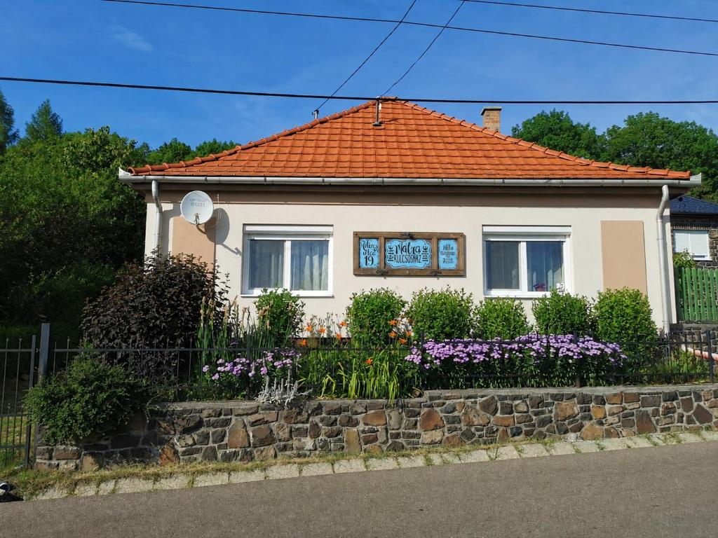 a small house with an orange roof at Mátra Kulcsosház - Mátraszentimre in Mátraszentimre