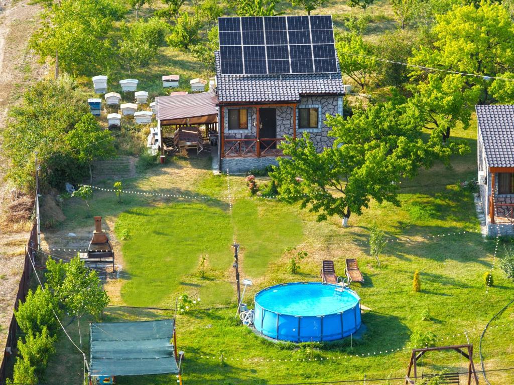 an aerial view of a backyard with a pool and a house at Noravank L-and-L in Aghavnadzor