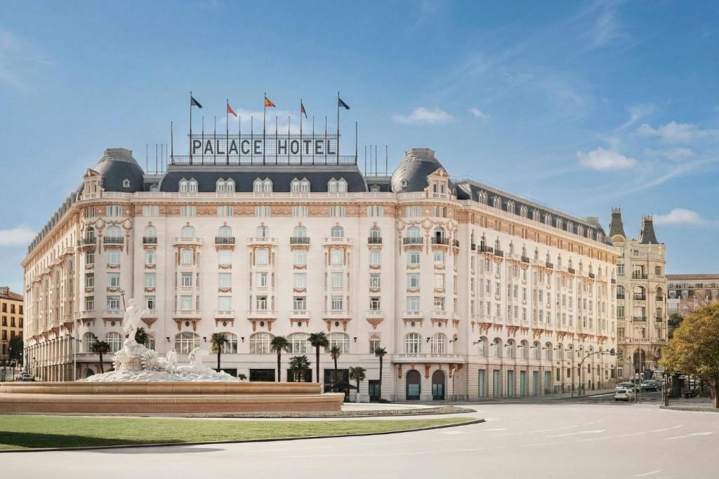 a large building with a sign on top of it at The Palace, a Luxury Collection Hotel, Madrid in Madrid