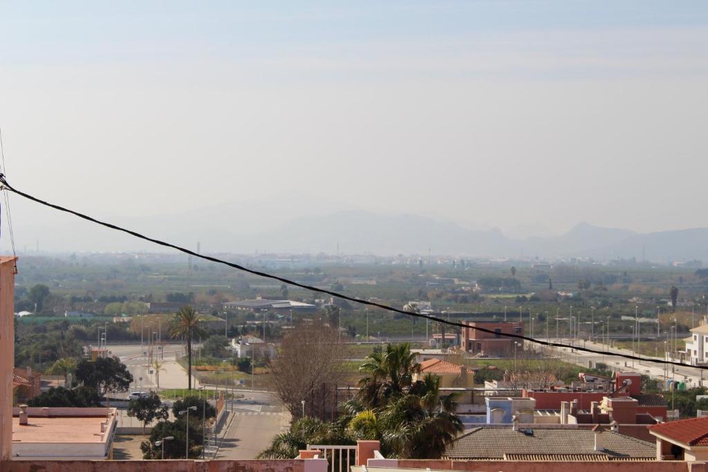 a view of a city with a town at Apartamentos Guillem in Playa de Miramar