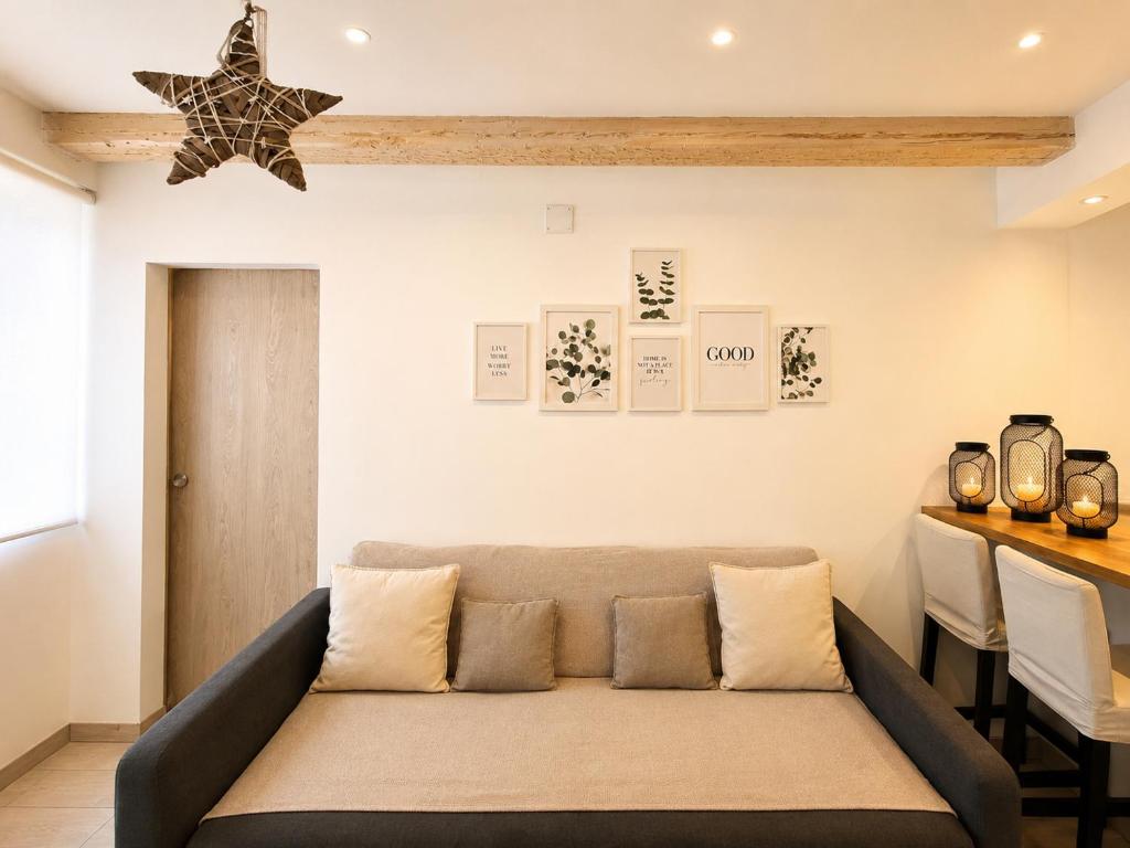 a living room with a couch and a table at Home Dream/Erstein/3P/60m2 in Erstein