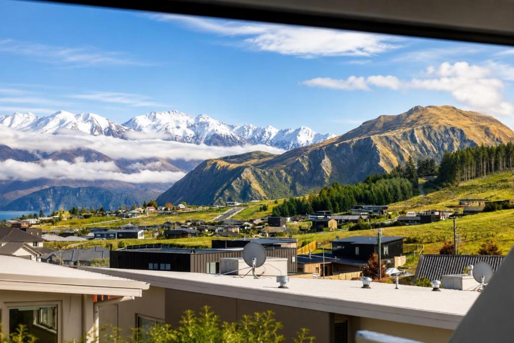 a view of the mountains from a building at Alpine Vista with Mountain Views, Pool and Spa in Wanaka