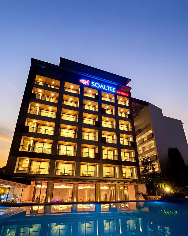 a large building with a santee sign on it at Soaltee Westend Lakeside Pokhara in Pokhara