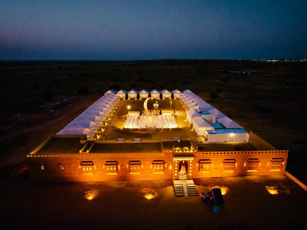 an aerial view of a building at night at Grand Inara Camp in Jaisalmer
