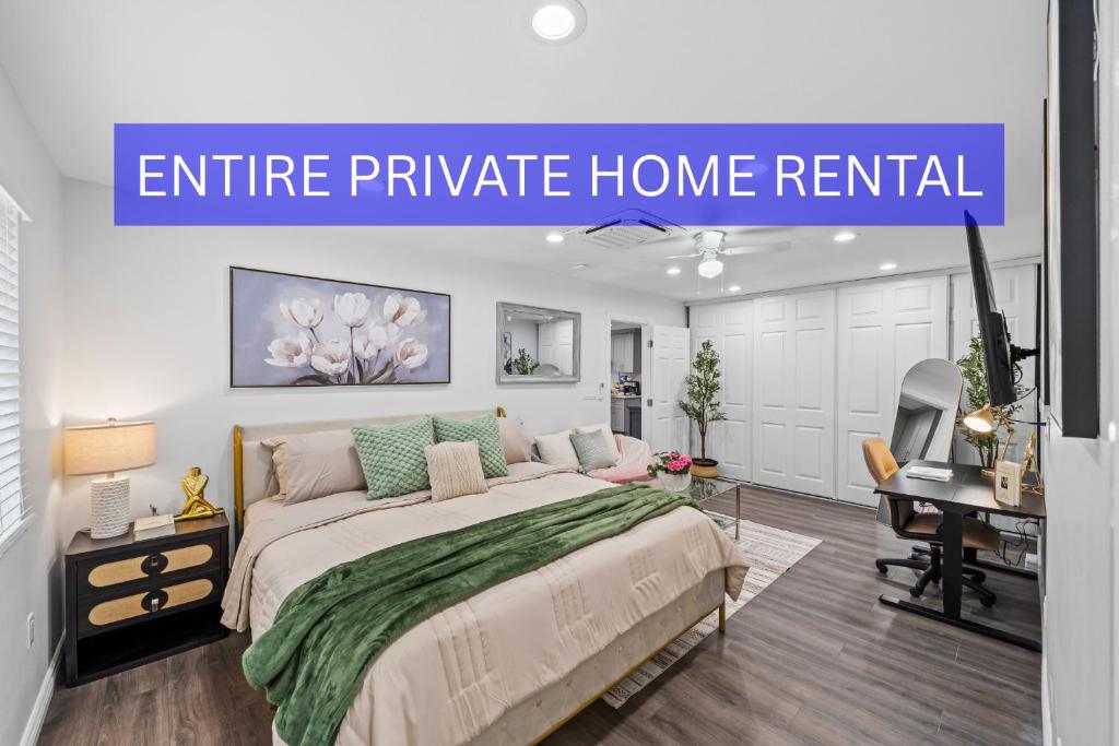 a bedroom with a bed and a desk in a room at Entire Private Home with Yard, King Bed, Prime Location, 3 Bedrooms 3 Bathrooms, Available Now in San Diego