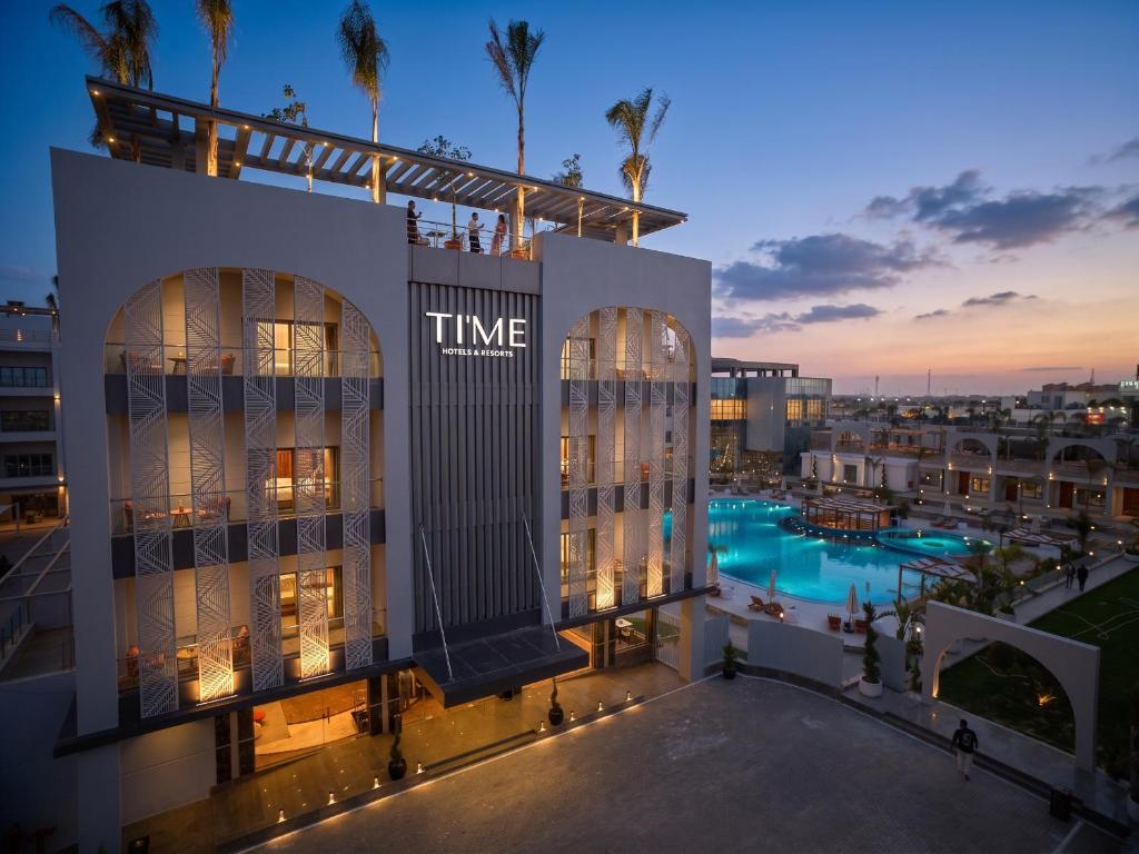 an aerial view of the time hotel at dusk at TIME Marina North Coast in El Alamein
