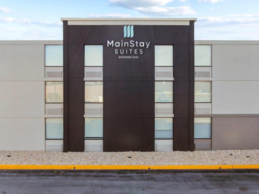 a building with a sign on the front of it at MainStay Suites Chambersburg in Chambersburg