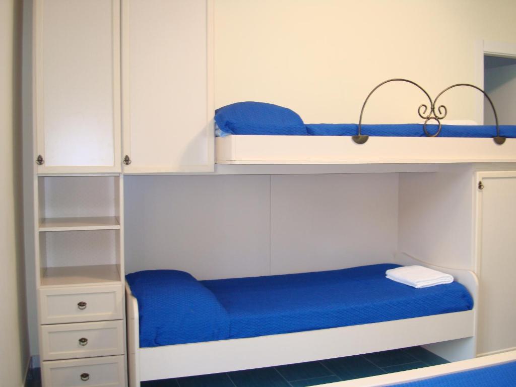 Postel nebo postele na pokoji v ubytování Guest House Mare e Luna