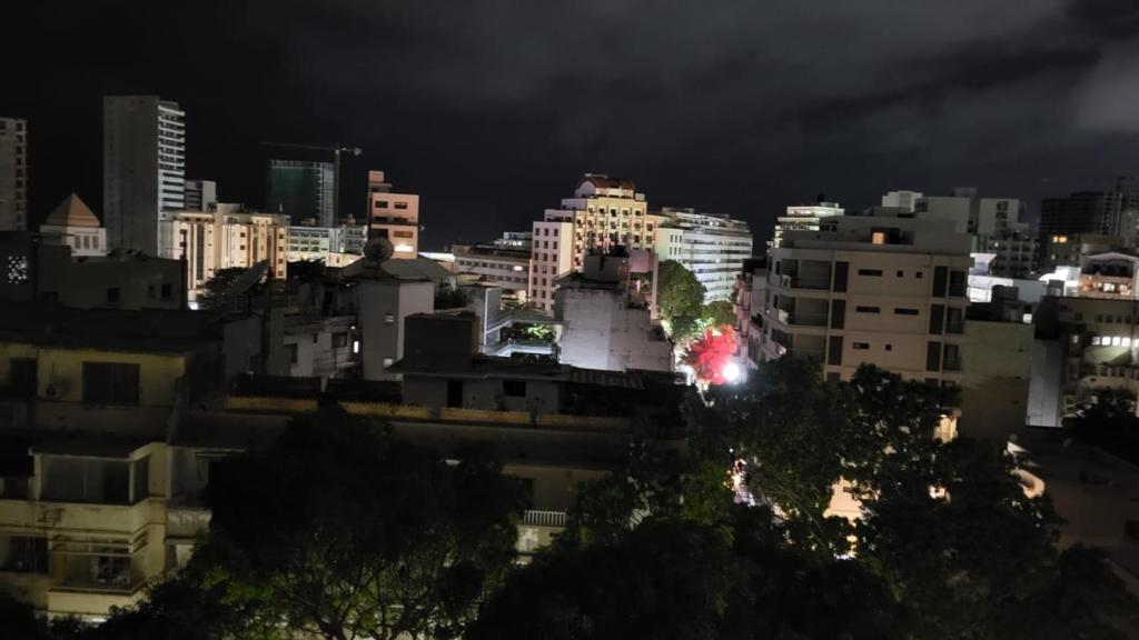 a view of a city at night at Central Dakar plateau apartment in Dakar