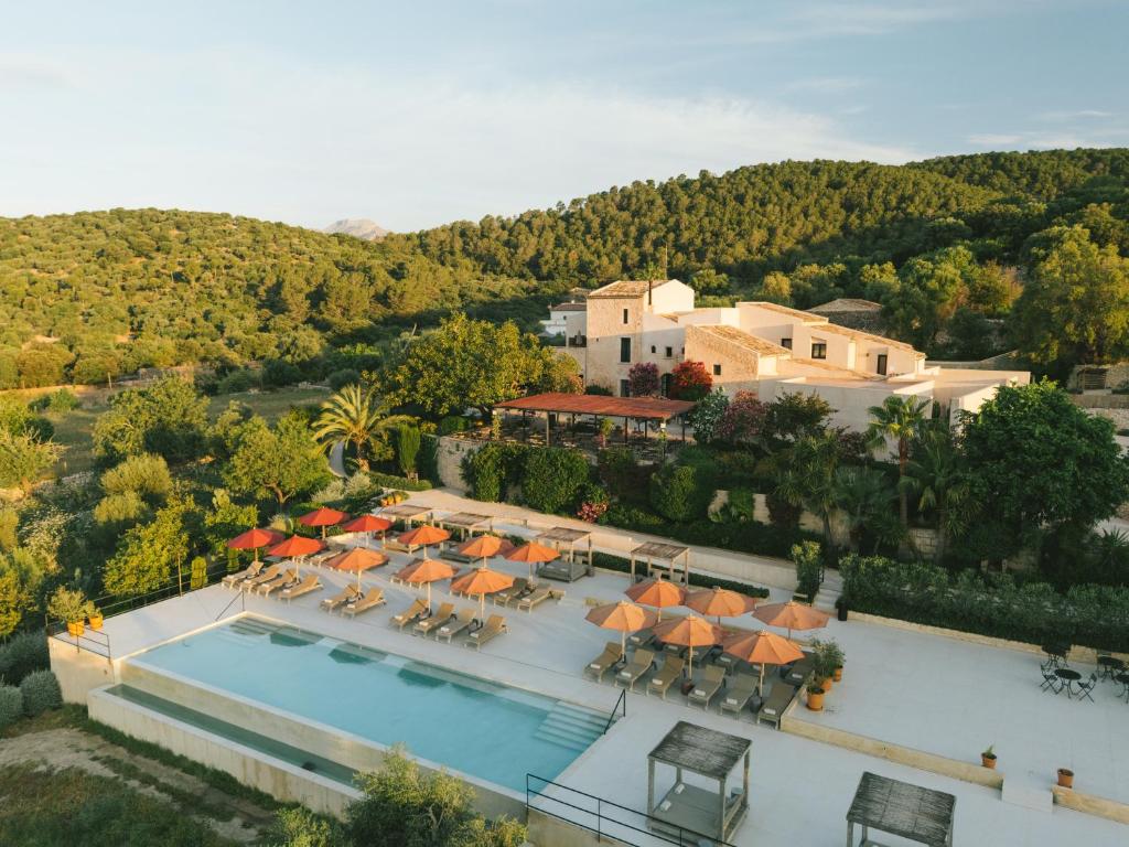 an aerial view of a resort with a swimming pool at The Lodge Mallorca, Small Luxury Hotels in Sa Pobla