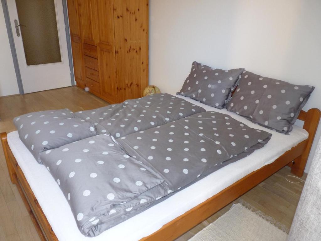 Posteľ alebo postele v izbe v ubytovaní Balokány apartman