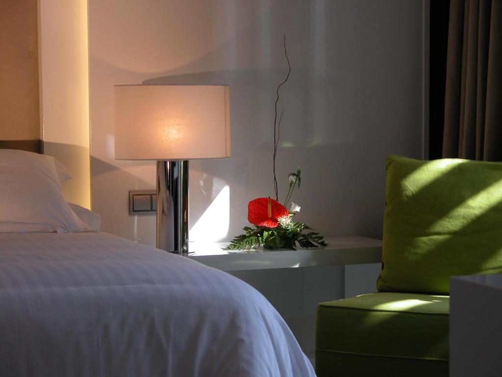 Postel nebo postele na pokoji v ubytování Hotel Palacio Albacete & SPA