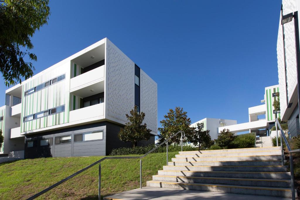 a building with stairs in front of it at Western Sydney University Village - Campbelltown in Campbelltown
