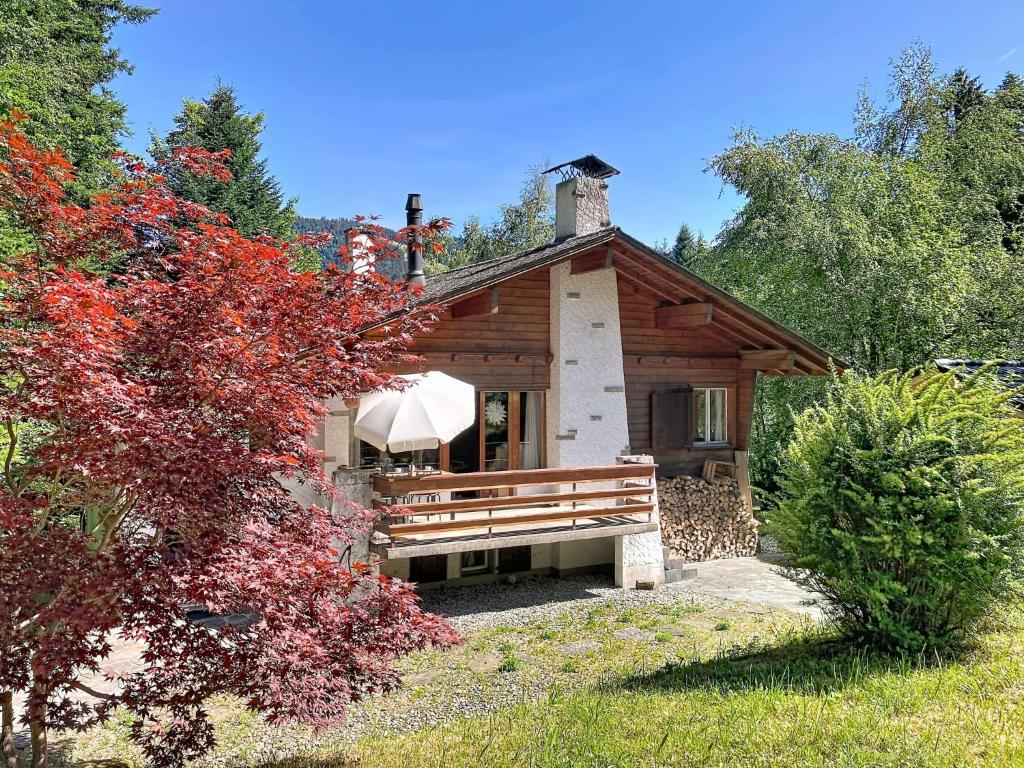 a small house with a bench in front of it at Chalet Chalet Chaudoudoux - Les Paccots by Interhome in Les Paccots