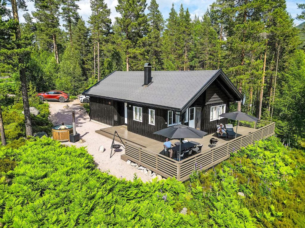 an overhead view of a house with people sitting on a deck at Chalet Vrådal by Interhome in Vradal