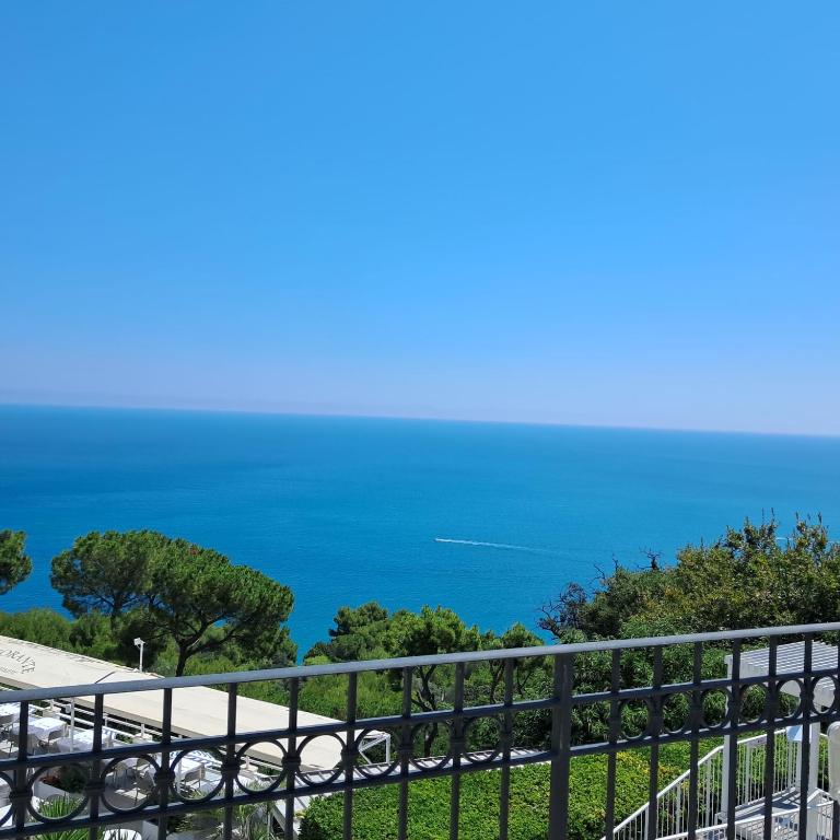 a view of the ocean from a balcony at Il Faro, Sirolo centro Vista Mare in Sirolo