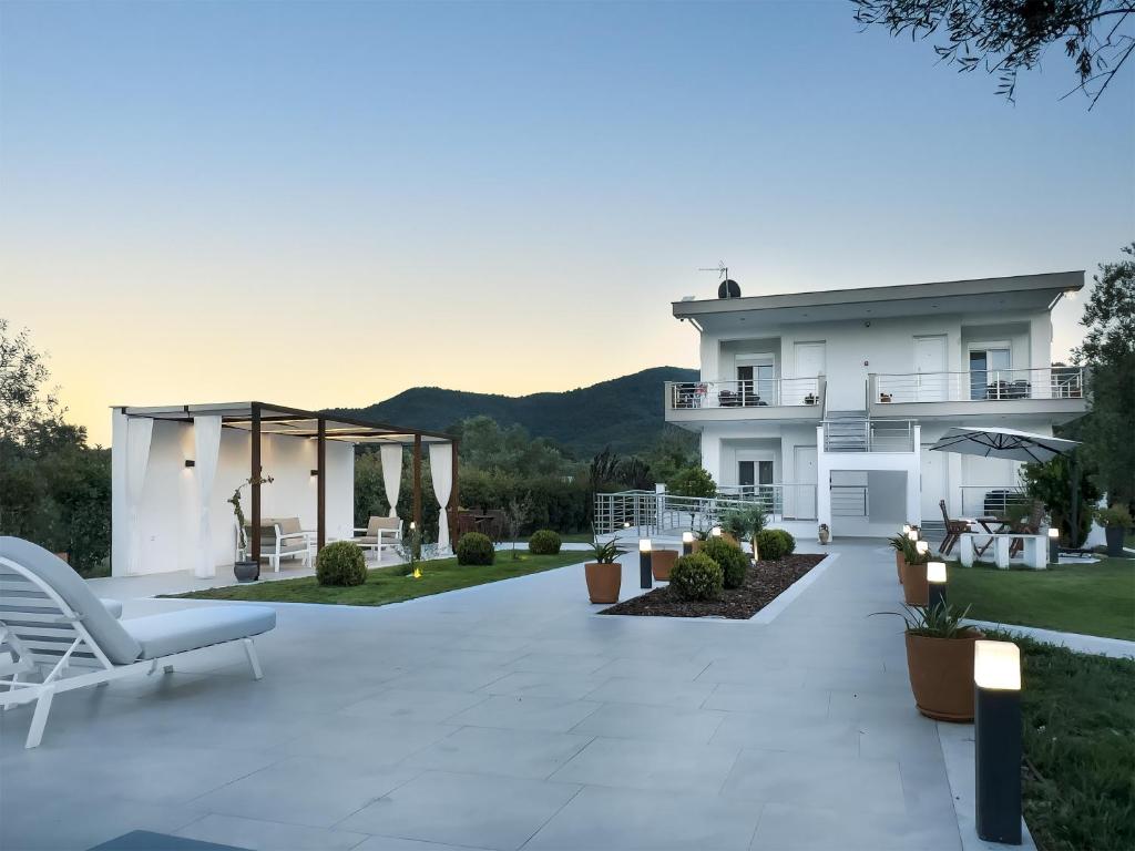a view of a house with a patio at Olive Garden in Olympiada