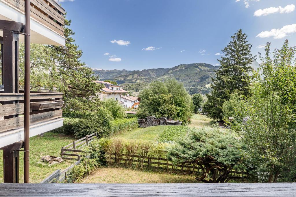 a view from the balcony of a house at Betù Holiday Apartment in Castello di Fiemme
