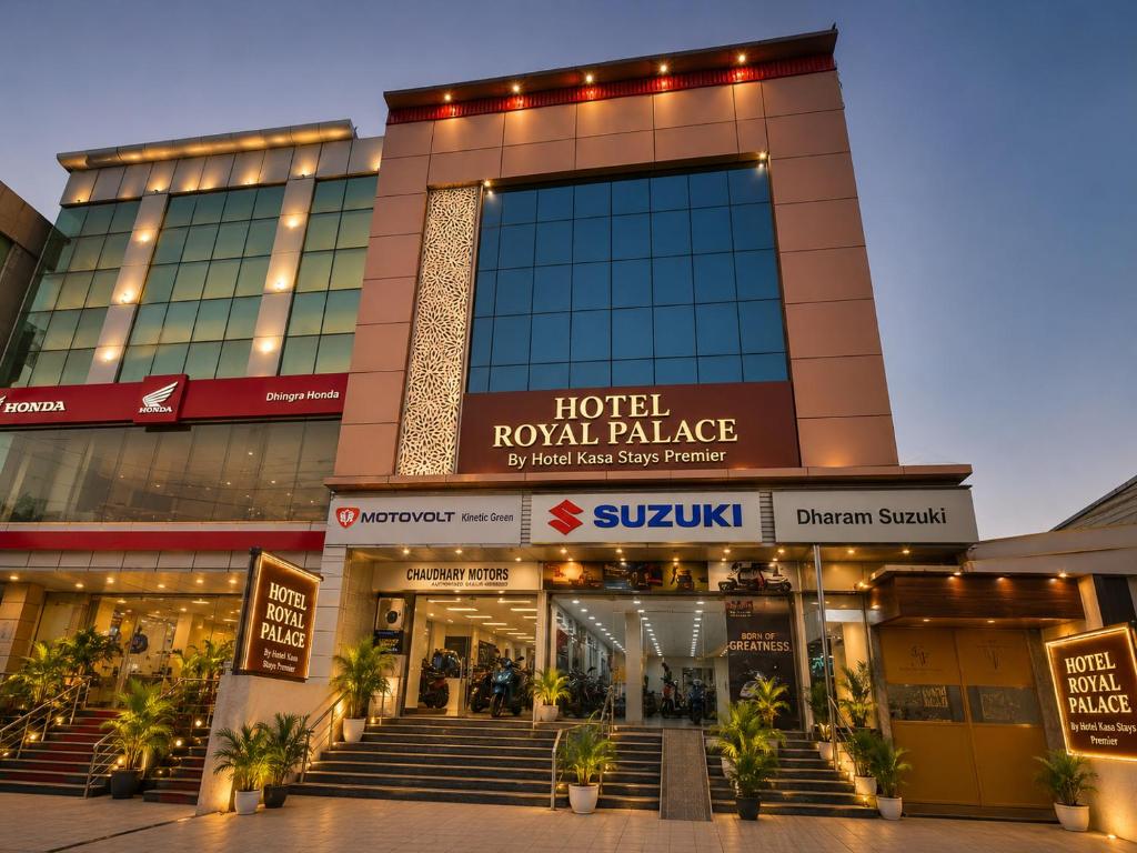 a hotel royal palace with stairs in front of it at Hotel Kasa Stays Premier - Peeragarhi Metro Station in New Delhi