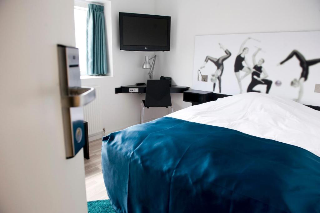 Postel nebo postele na pokoji v ubytování Hotel DGI-Huset Herning