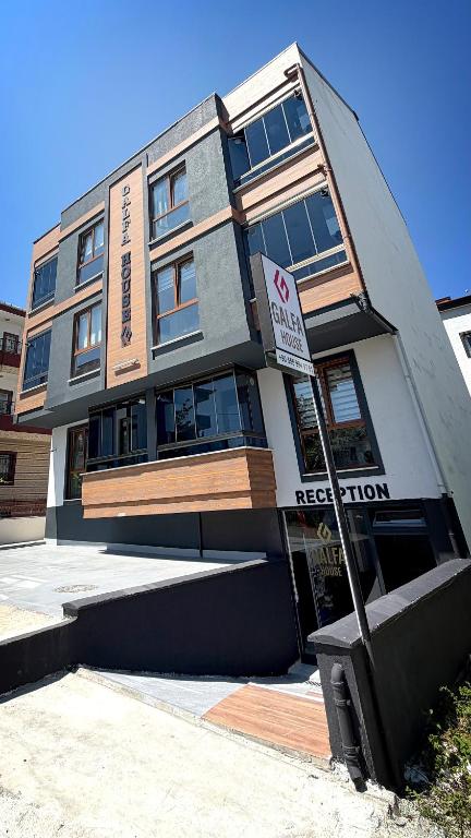 a no parking sign in front of a building at Galfa House in Bostancı