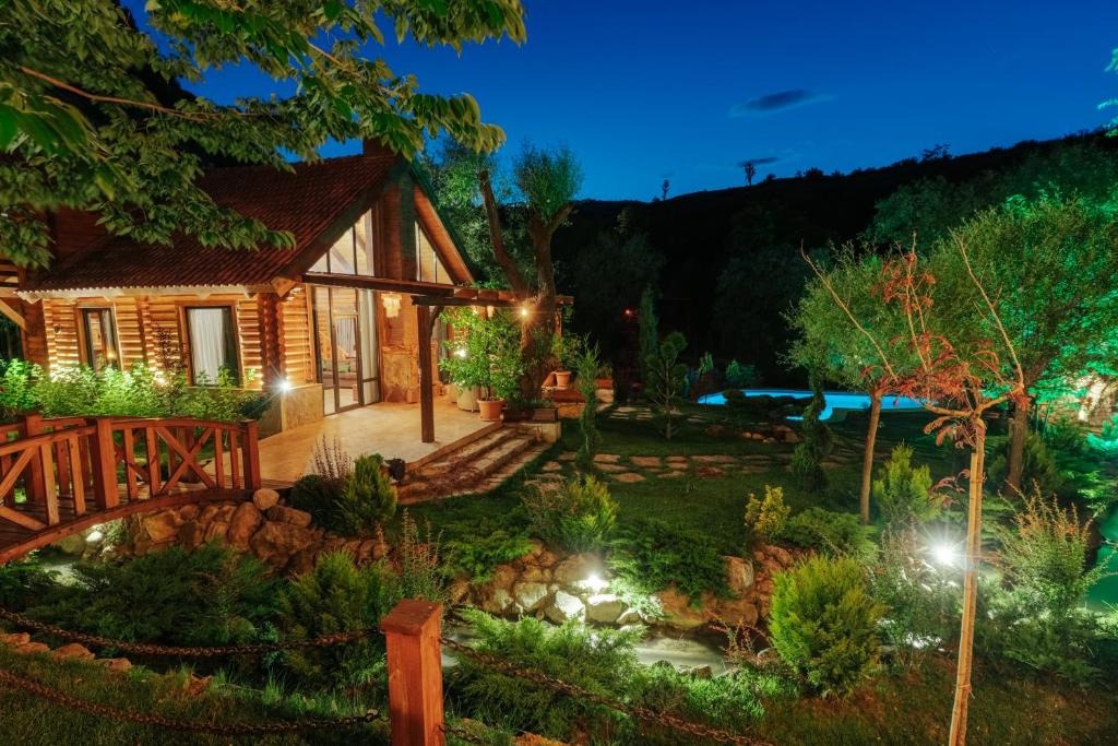 a house with a garden at night with lights at Getahovit Resort in Ijevan