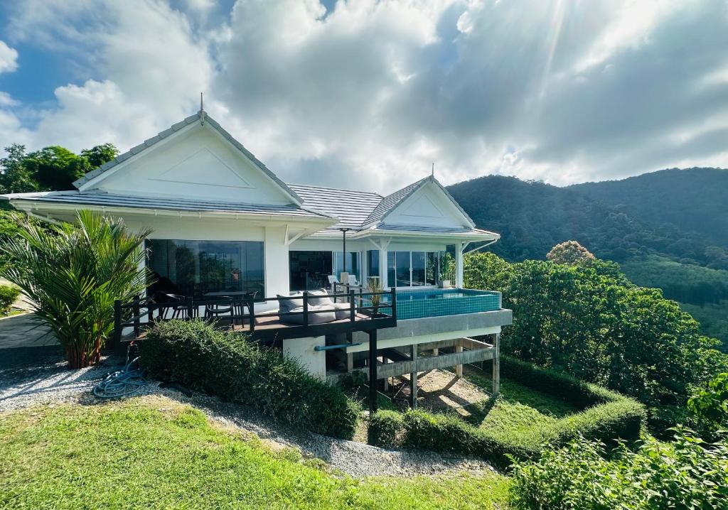 a house on top of a hill with a view at White Villa Lanta in Ko Lanta