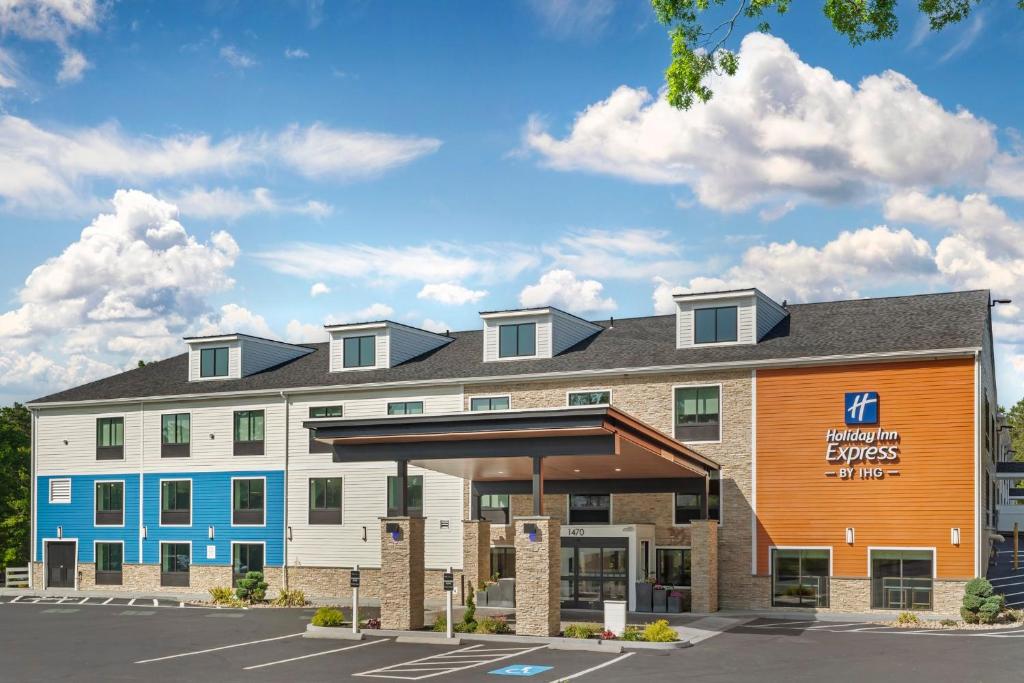 a rendering of a hotel with a parking lot at Holiday Inn Express Hyannis - Cape Cod by IHG in Hyannis