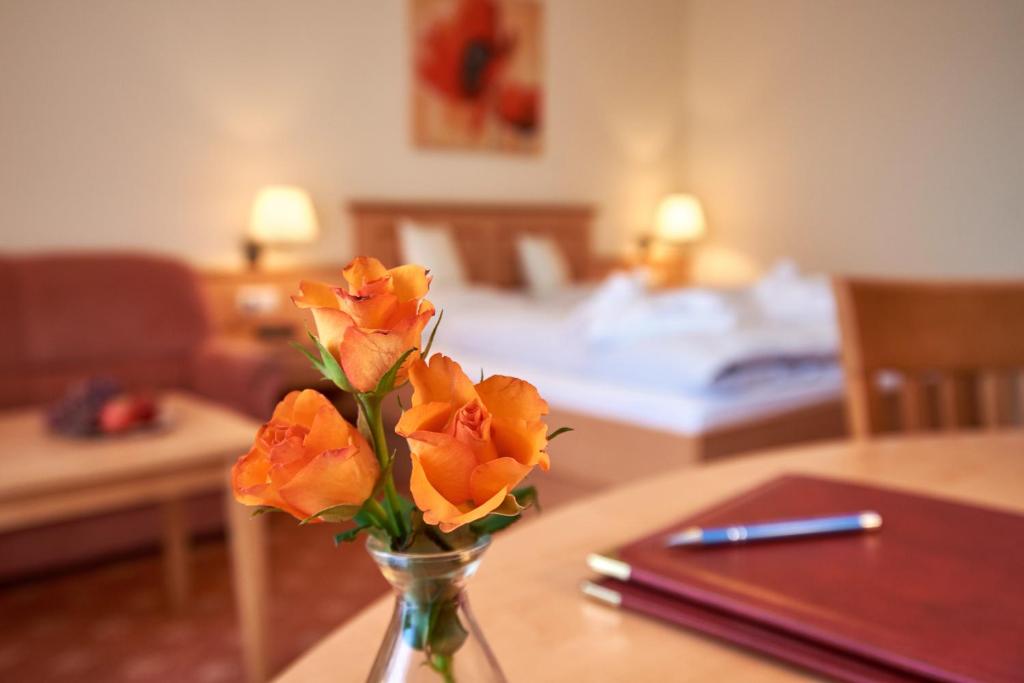 Postel nebo postele na pokoji v ubytování Apparthotel Minerva Diana Octavia