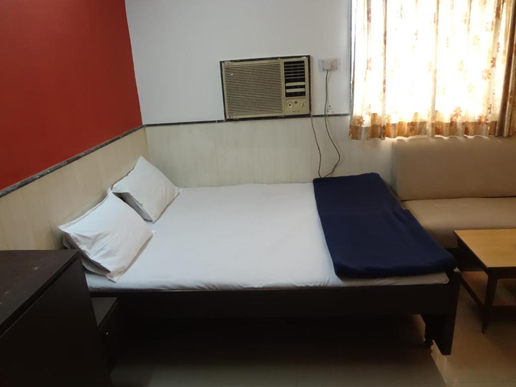 Postel nebo postele na pokoji v ubytování Hotel Happy Home