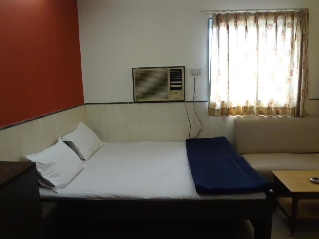 Postel nebo postele na pokoji v ubytování Hotel Happy Home