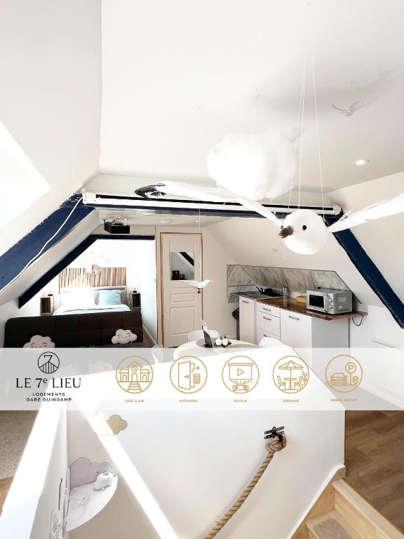 a living room with a ceiling fan in a room at Le Nuage - Vidéoprojecteur - Terrasse - 5min Gare in Ploumagoar