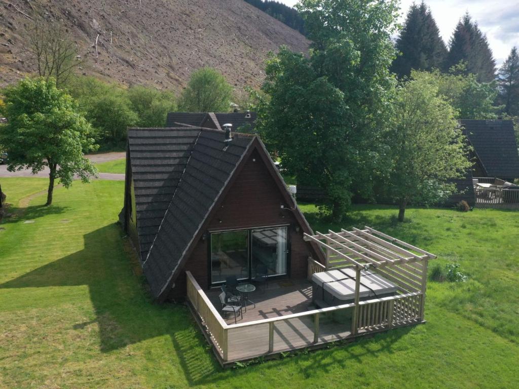an overhead view of a tiny house in a field at Chalet Invergarry Combi by Interhome in Spean Bridge