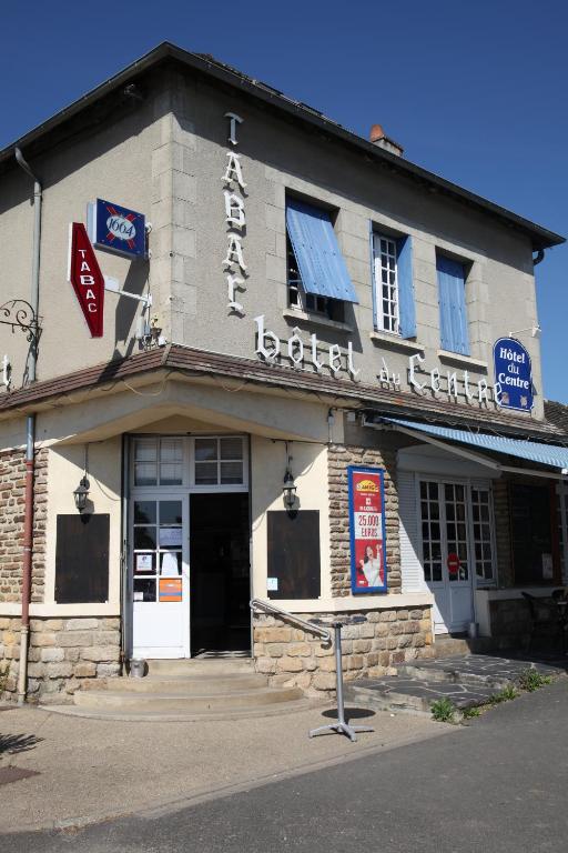 a building with a sign on the front of it at hôtel du centre in Saint-Benoît-du-Sault