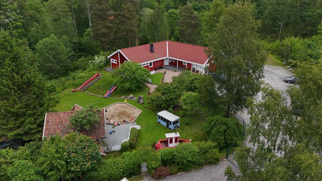 an aerial view of a house with a yard at Vaicay Garden Resort in Arendal