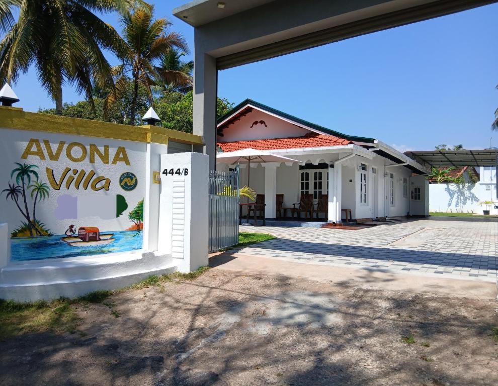 a building with a sign that reads avona villa at Avona Villa in Bopitiya