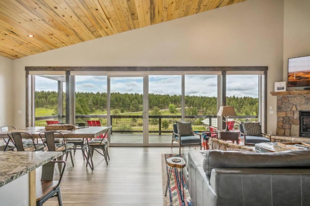 a living room with a couch and a table at 128 Capitan Circle ("Basecamp") in Pagosa Springs