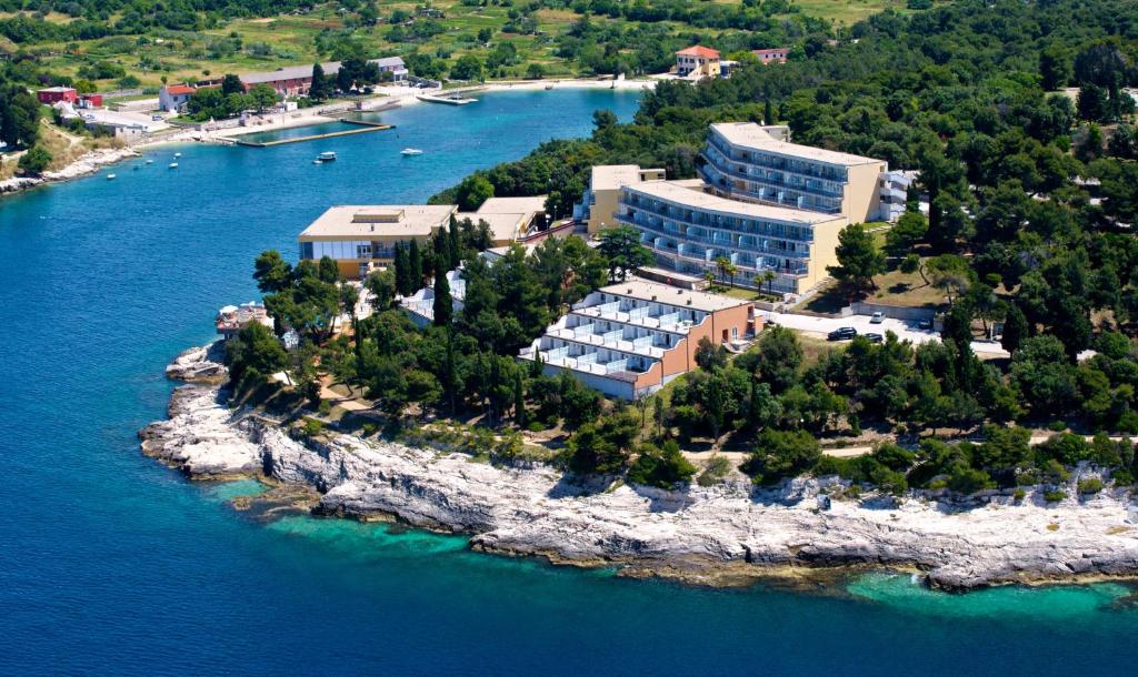 an aerial view of a resort on an island in the water at Splendid Resort in Pula