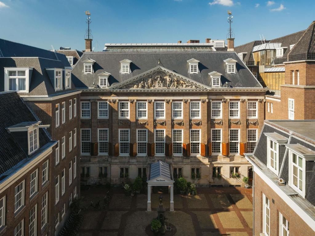 an aerial view of a large building with many windows at Sofitel Legend The Grand Amsterdam in Amsterdam