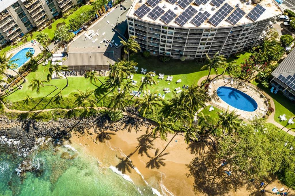 an aerial view of a resort with palm trees at The Hale Pau Hana in Kihei
