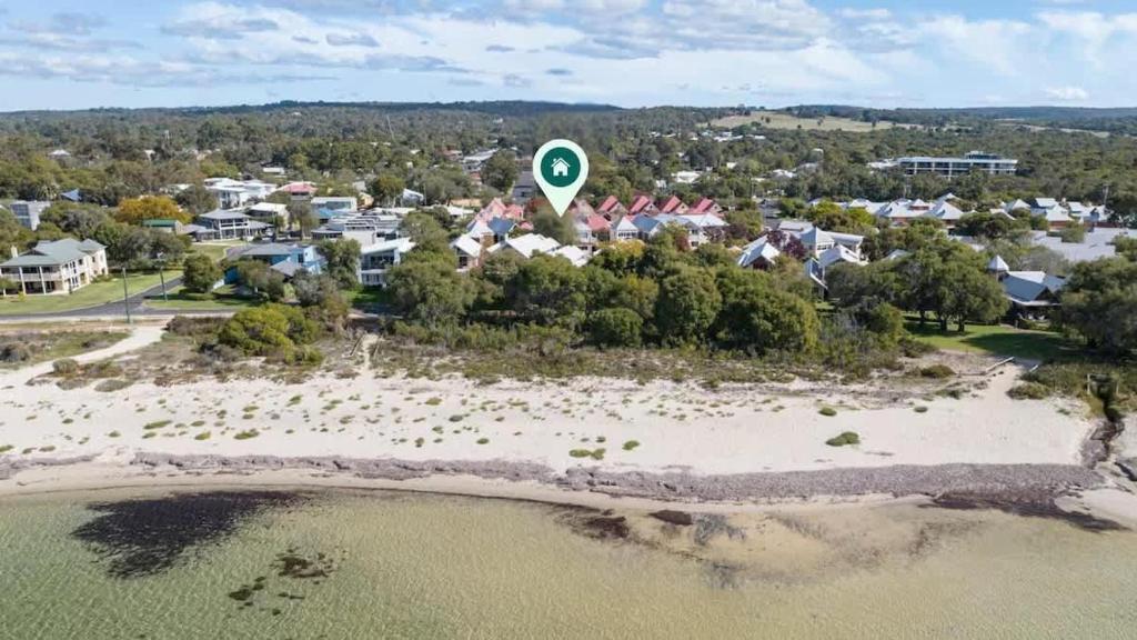 an aerial view of an island in the water with houses at Clearwater - Cosy Comforts Steps from the Beach in Dunsborough