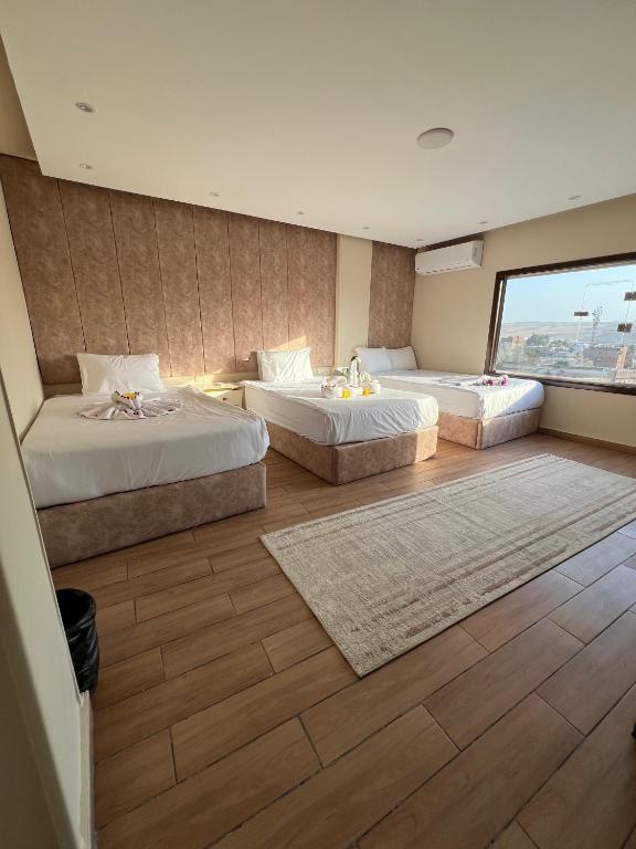Chambre Triple – Vue sur Montagne