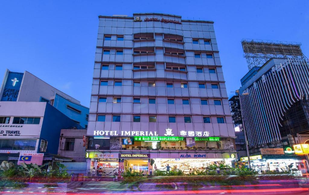 a hotel in the middle of a city with buildings at Hotel Imperial in Kuala Lumpur
