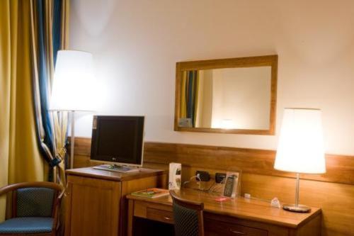 A television and/or entertainment centre at Hotel Master