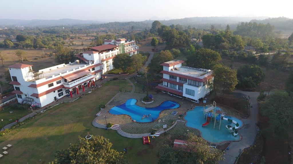 an aerial view of a resort with a water park at Khanvel Resort in Silvassa