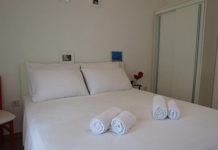 Postel nebo postele na pokoji v ubytování SD House Rooms