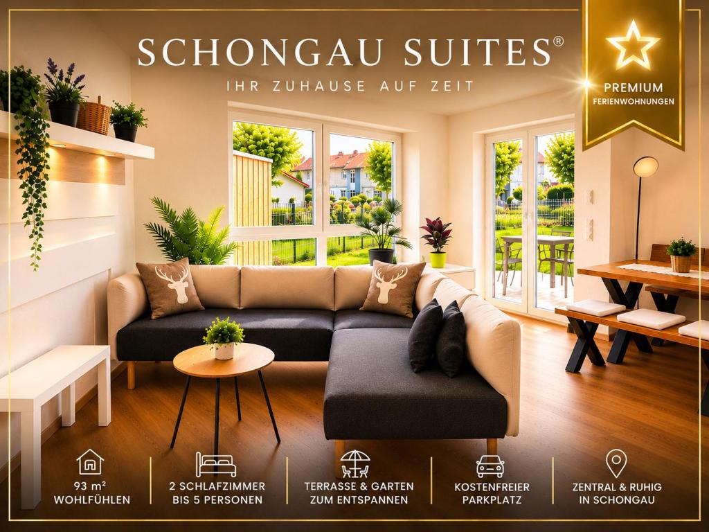 a living room with a couch and a table at Schongau Suites Premium Apartments XL in Schongau