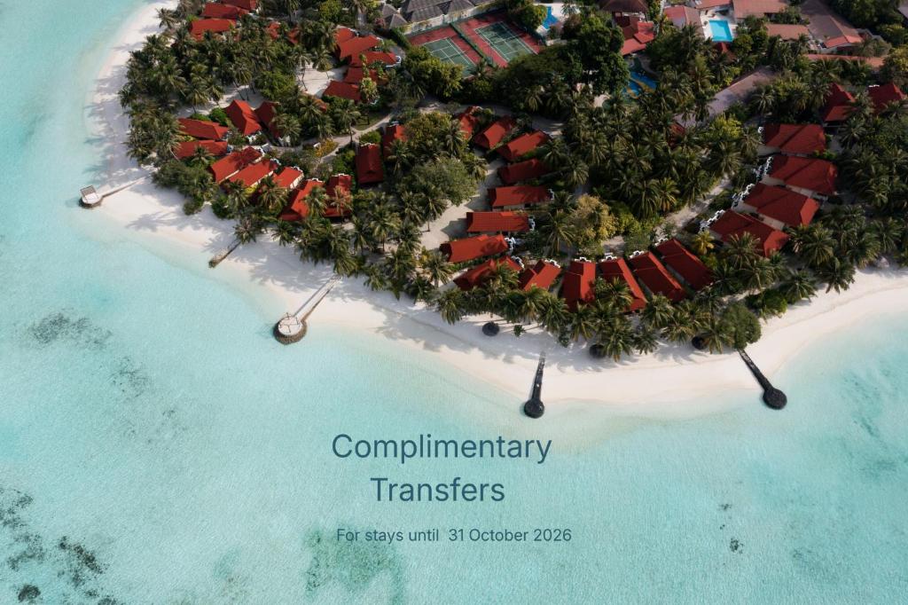 an aerial view of a resort on a tropical island at Niva Kurumba Maldives in Male City