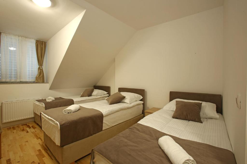 Postel nebo postele na pokoji v ubytování Gostilna in prenočišča Gedžo