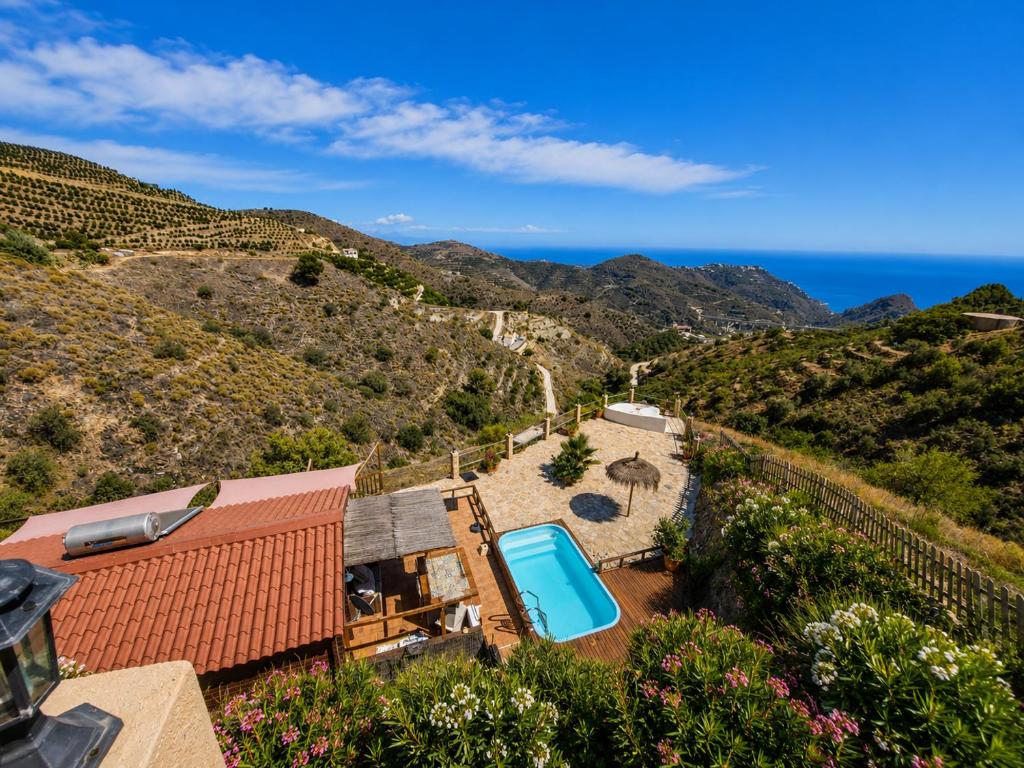 an image of a house with a view of the ocean at Finca Mariposa Mariposaholidays in Nerja